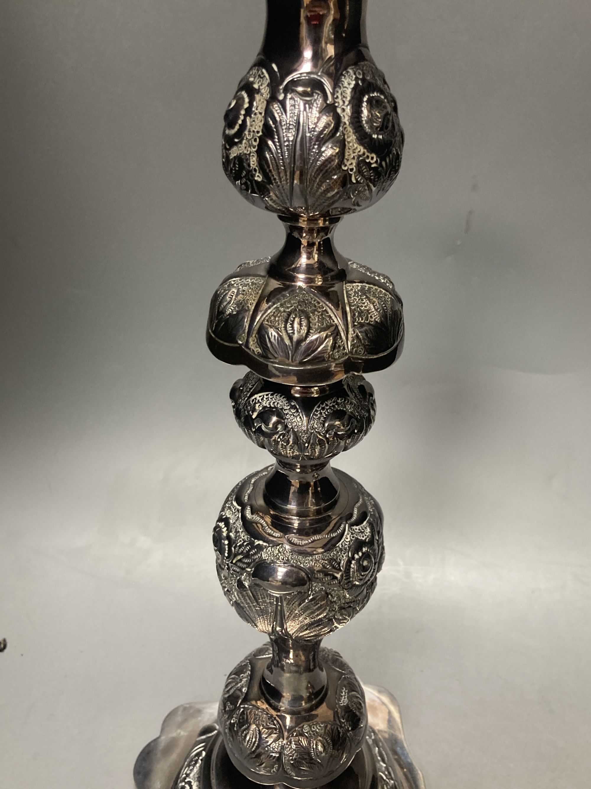 A pair of Edwardian silver Sabbath Day candlesticks, by Rosenzweig & Taitelbaum, London, 1909, 37.5cm, 34oz.